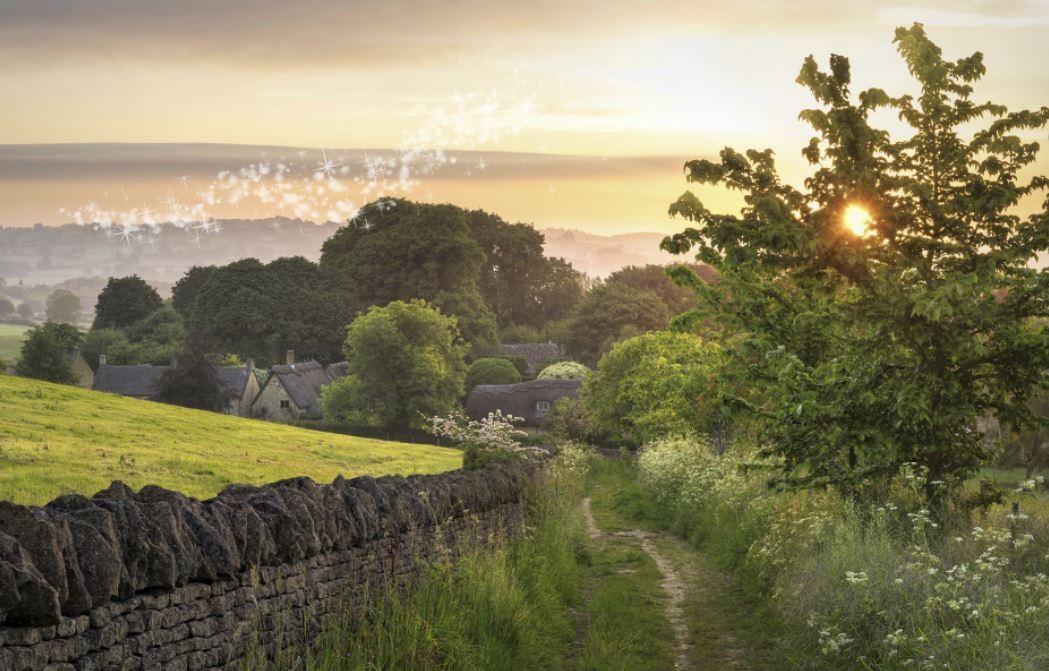 Village with Sparkles in England with a country lane, fields and trees Village with Sparkles in England with a country lane, fields and trees